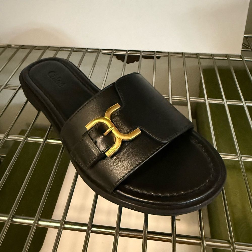Brand new with box Chloe women’s size 6 Black Slide Sandals with Gold Accent